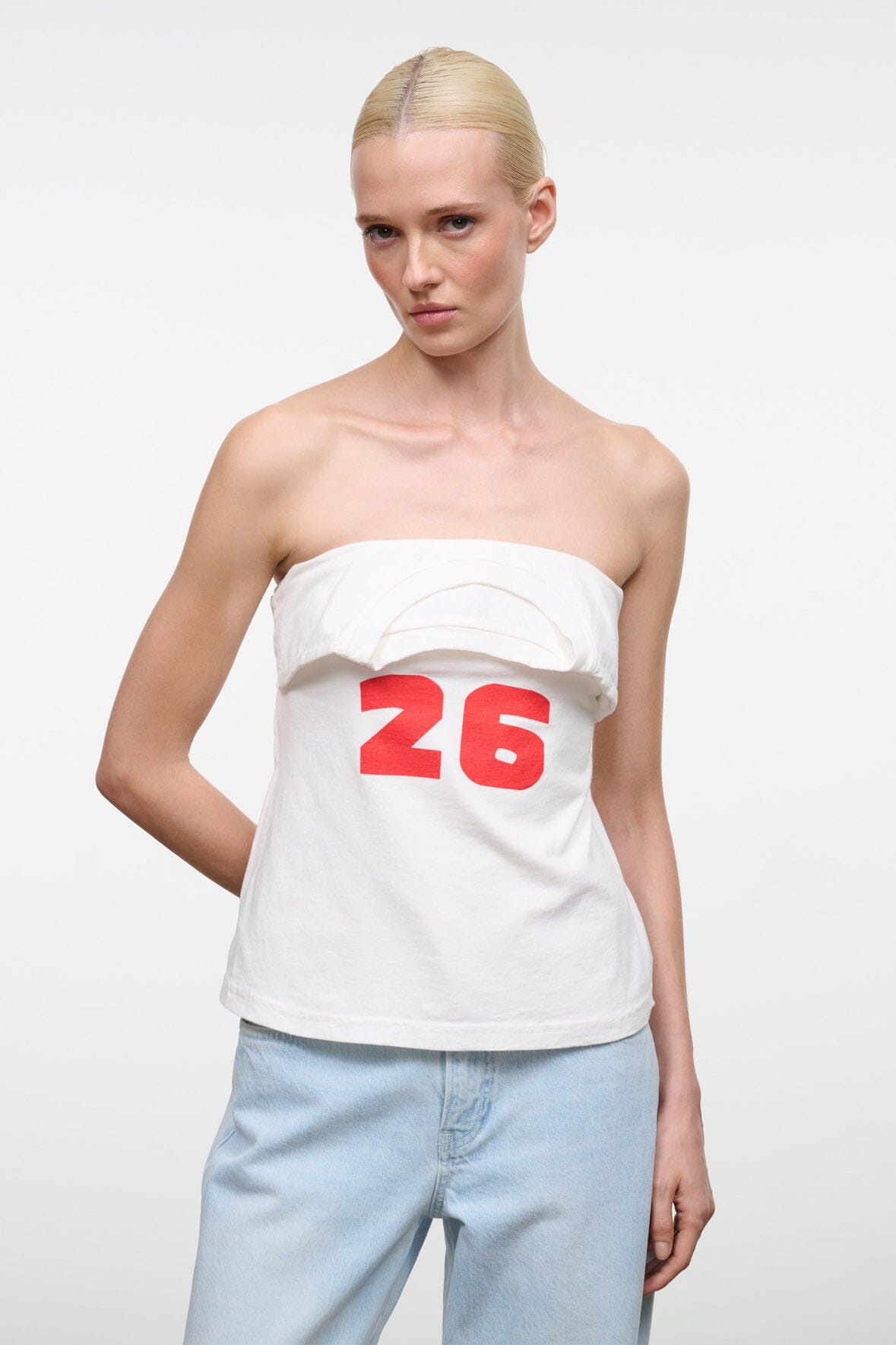 Strapless white graphic top with red 26