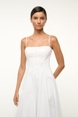White midi dress with square neckline, thin straps, and fitted waist paneling