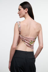 Silk scarf draped as back top in pink floral paisley print, green and gold accents.