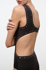 Black one-piece swimsuit with studded trim and scoop back straps