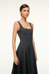 Black sleeveless midi dress with thin straps, fitted bodice, and gathered skirt