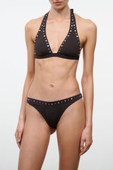 Black bikini bottom with studded waistband border and minimal back coverage