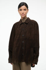 Dark brown suede overshirt, pointed collar, front button placket, chest and side pockets.
