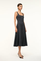 Black sleeveless midi dress with thin straps and pleated, flared skirt