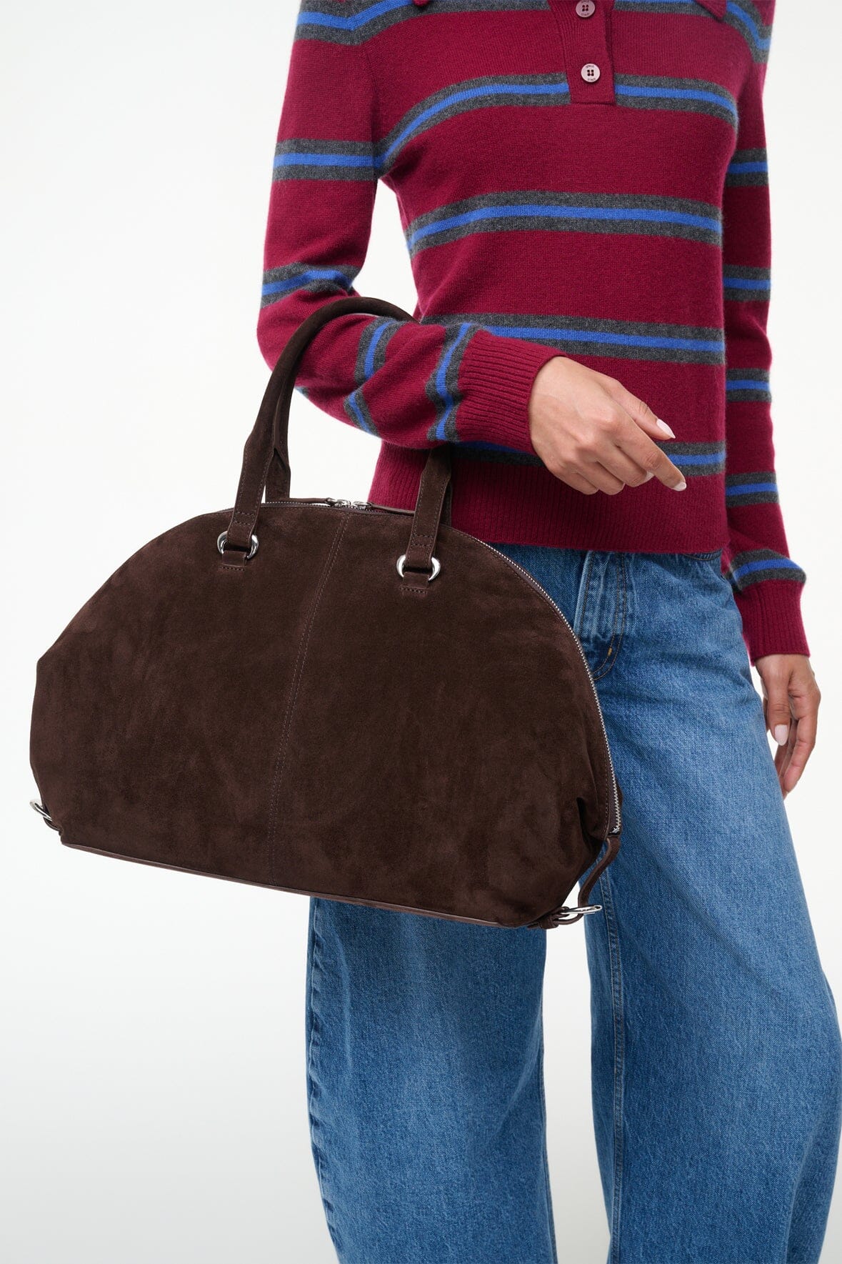 Brown suede satchel bag with curved top handles and metal zipper