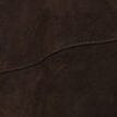 Brown suede fabric texture close-up with visible seam lines and nap.