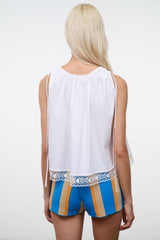 White sleeveless top, scoop back with gathered shoulders and lace-trim hem