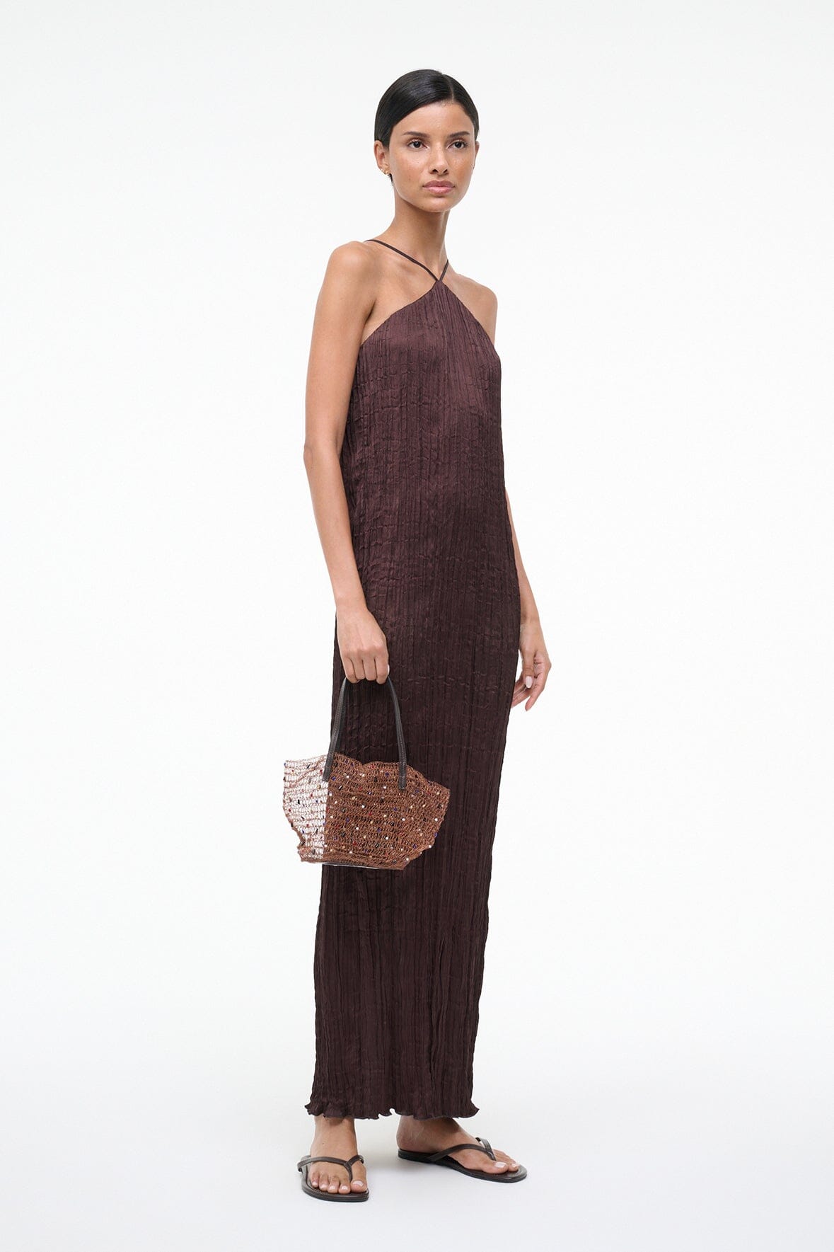 Multi-color beaded bucket bag with top handle and woven mesh body