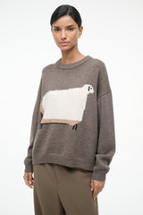 Taupe crewneck knit sweater featuring white sheep applique with small legs