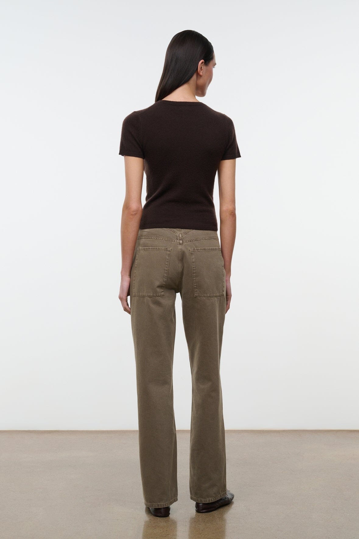 Greige straight-leg jeans, back view with yoke and belt loops