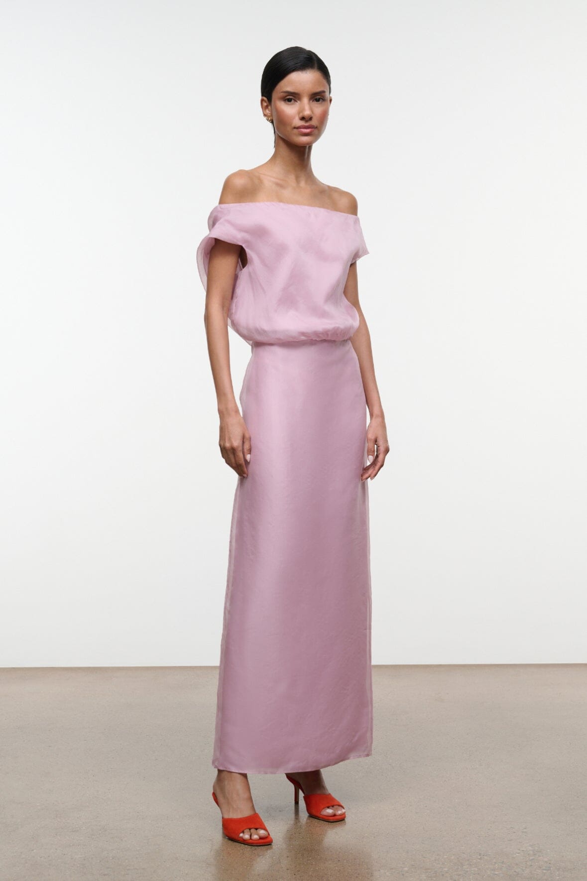 Dusty pink off-shoulder maxi dress with gathered waist and long straight skirt