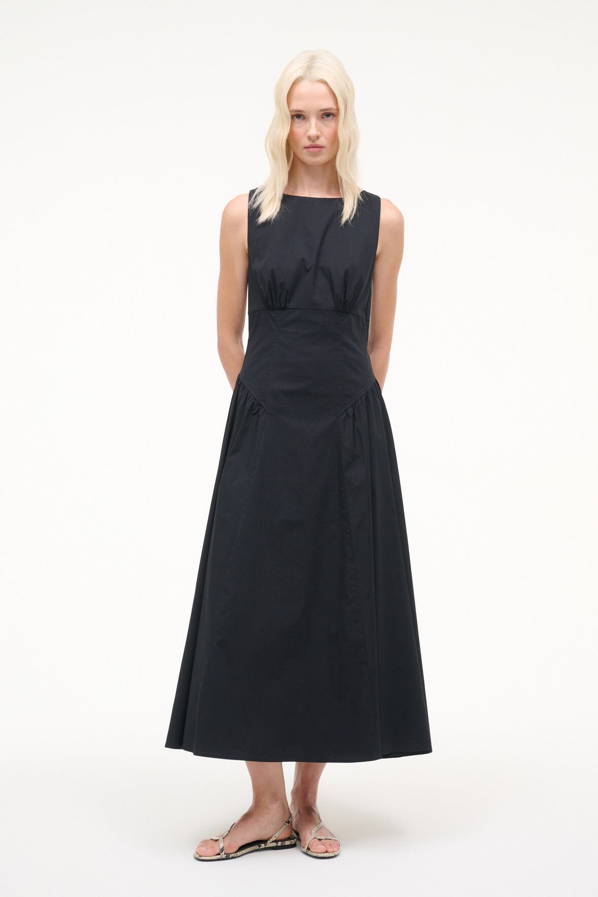 Black sleeveless midi dress with round neckline and gathered waist A-line skirt