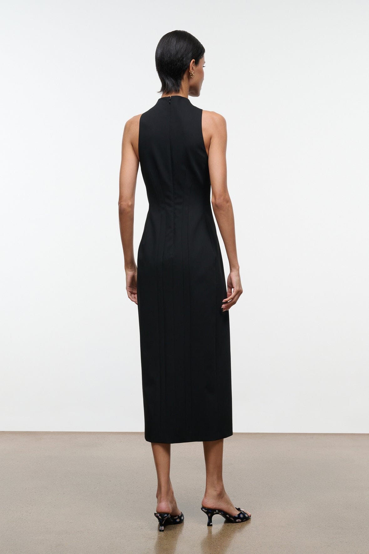 Black sleeveless midi dress with solid back and high neckline