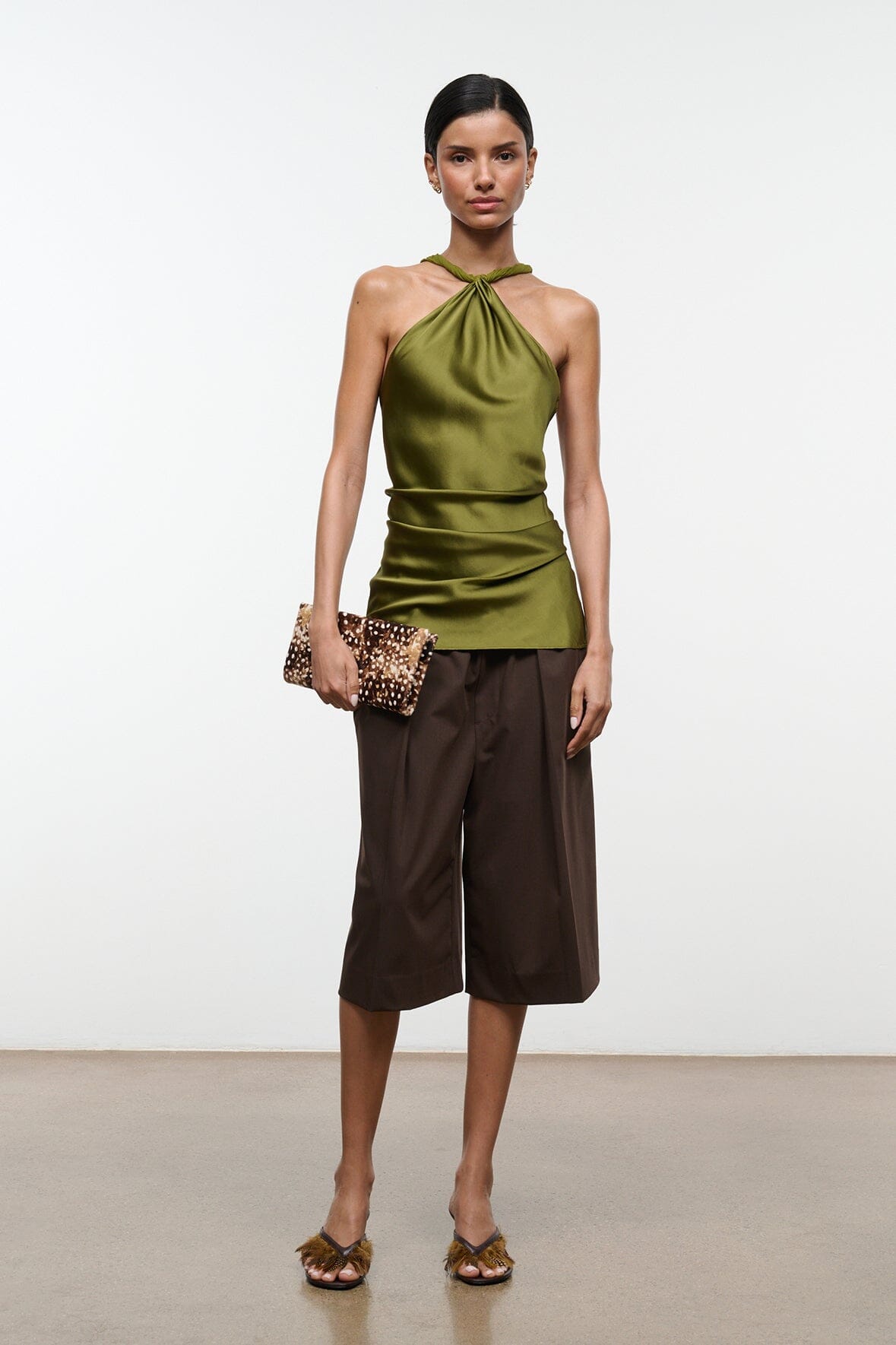 Olive green silk halter top with draped knot at neckline