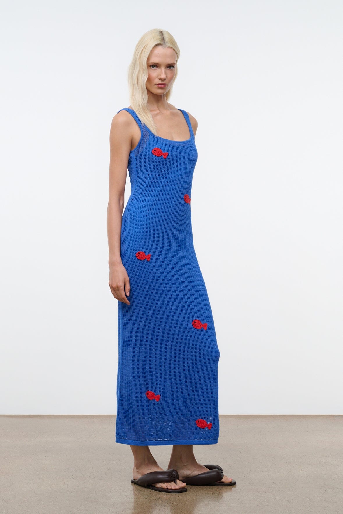 Blue sleeveless maxi dress with red fish motifs