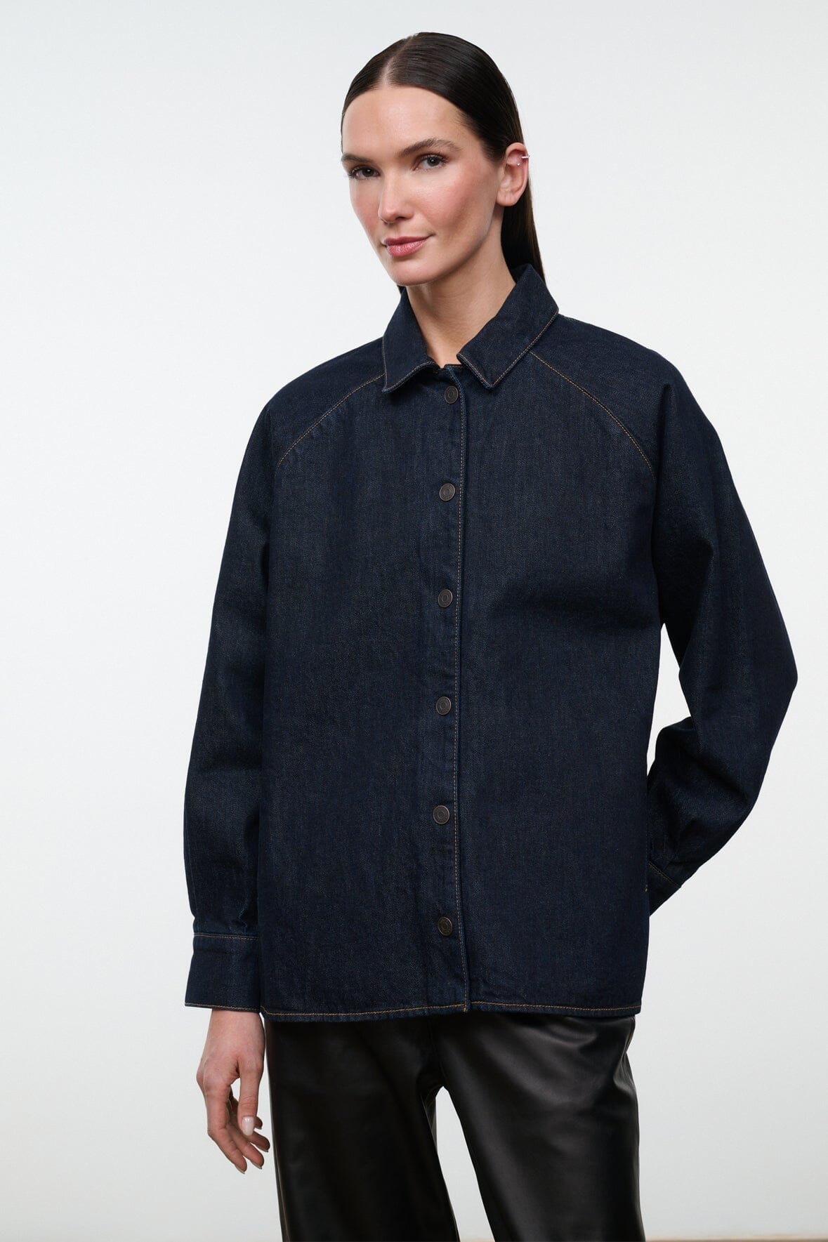 Indigo denim shirt jacket with button-up front and pointed collar, long sleeves