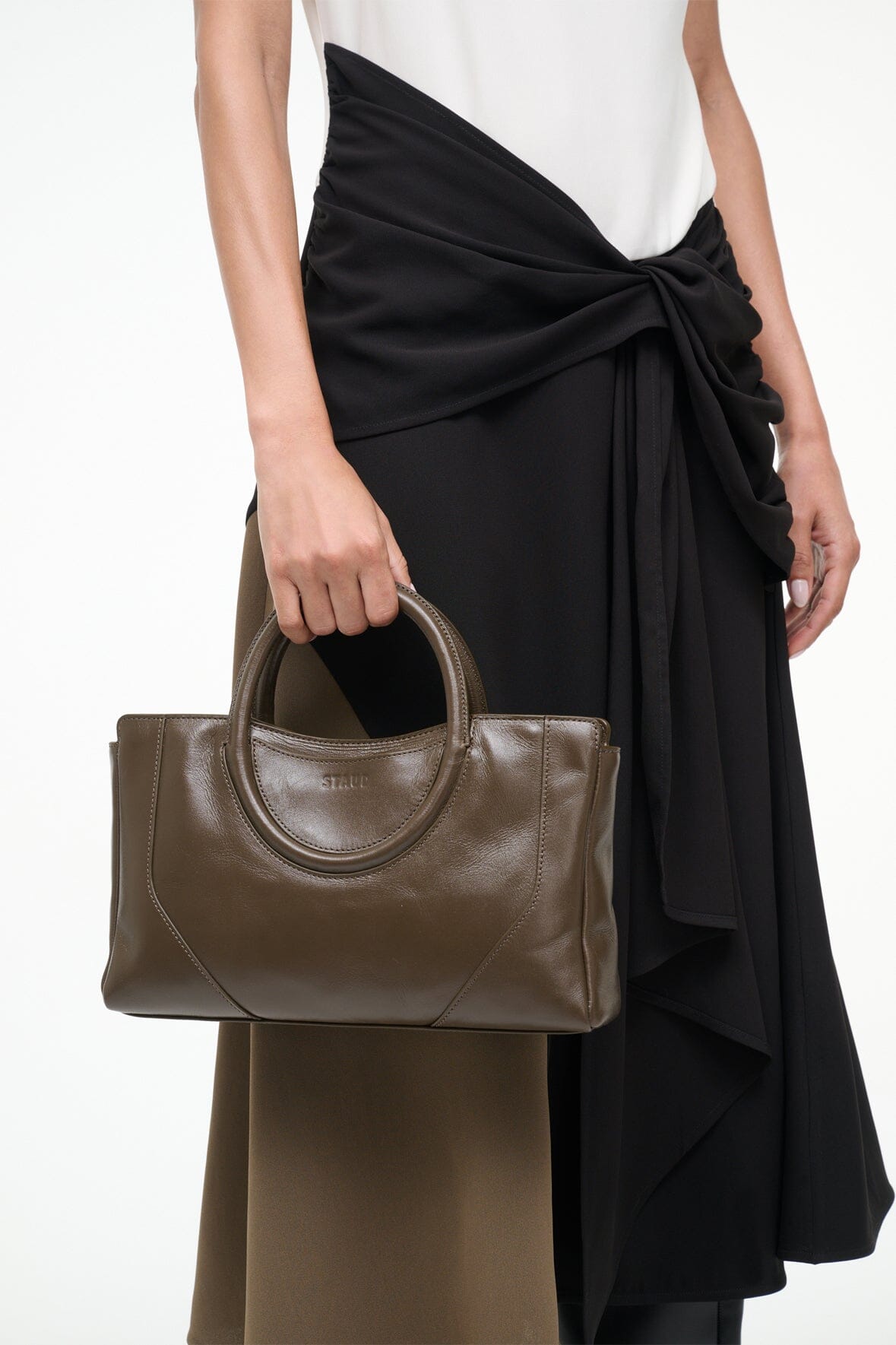 Mini satchel bag in truffle brown with top handles and front seam detail