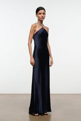 Navy halter satin maxi dress with beaded halter strap, sleeveless drape