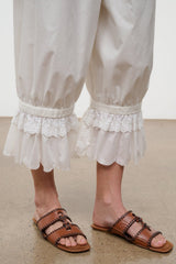 Tan slide sandals with braided straps and open toe