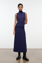 Midnight sleeveless turtleneck knit top with ribbed hem, deep navy blue