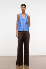 Light blue silk dupioni sleeveless top, front view with V-neck frog fastenings