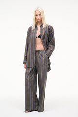 Dark vertical striped button-front top with long sleeves