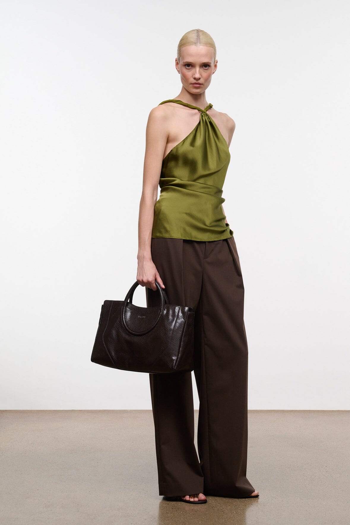 Espresso snake-print satchel with short top handles and textured dark brown exterior