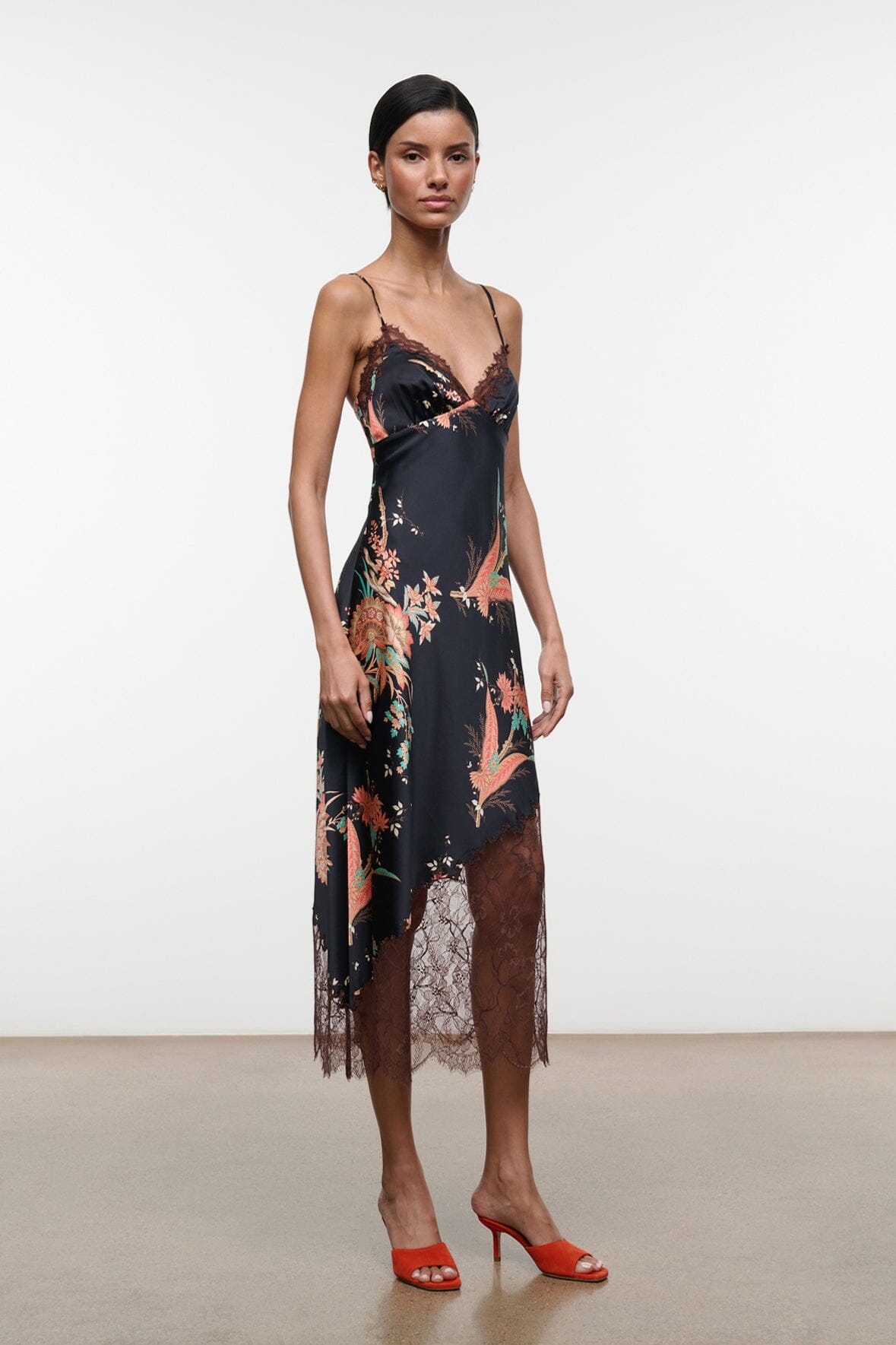 Black silk dress with floral tapestry print and lace hem, spaghetti straps, midi length