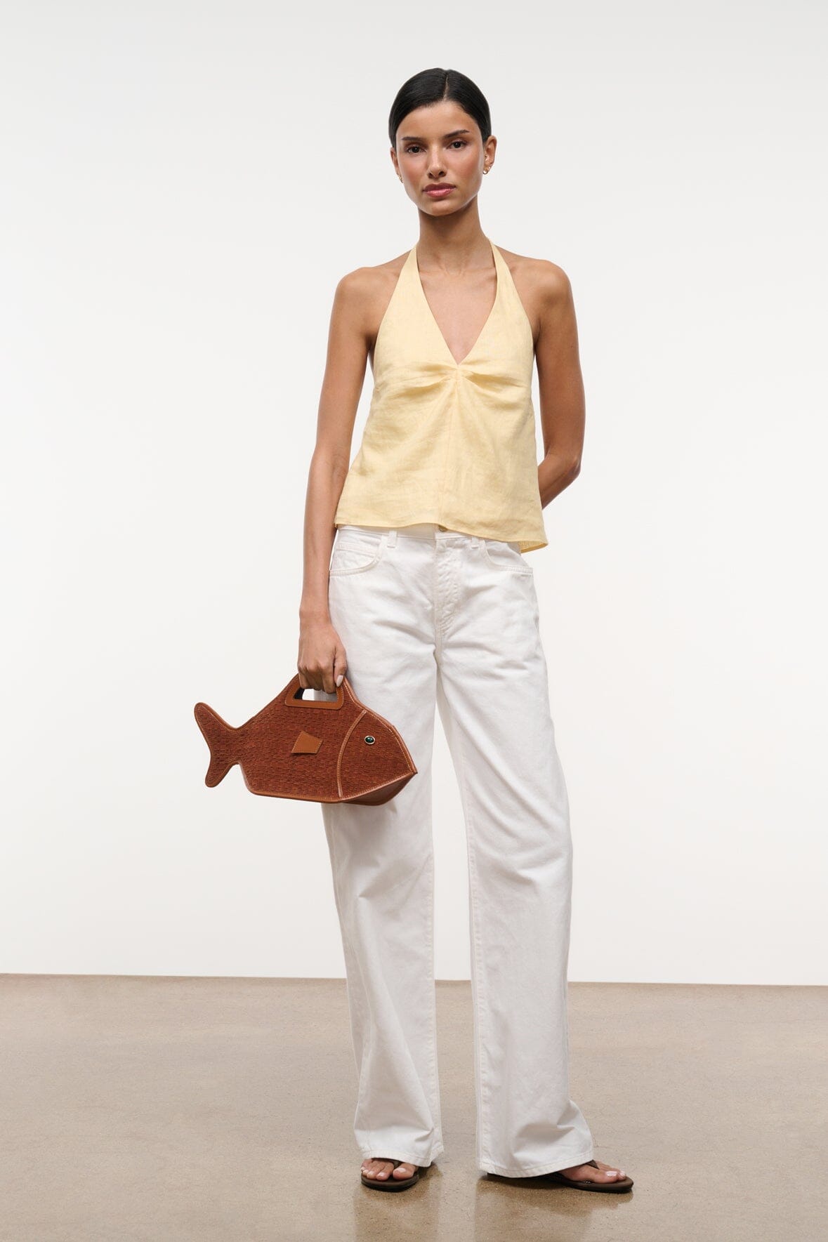 Butter linen halter top with draped V neckline and gathered waist