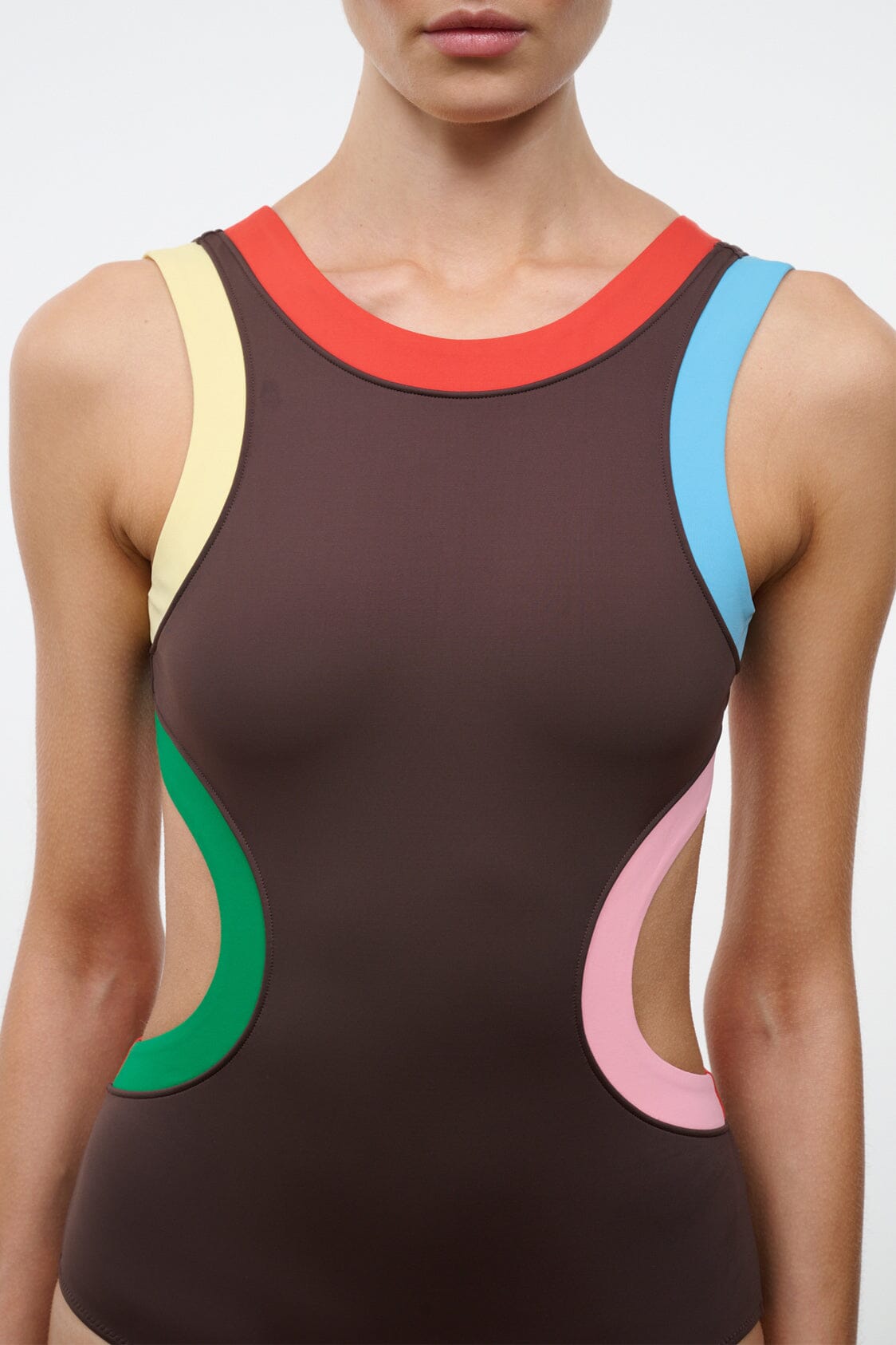 Dark brown one-piece swimsuit with red collar and multicolor side panels