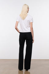 Black relaxed jeans with wide leg, belt loops, front fly, and front pockets