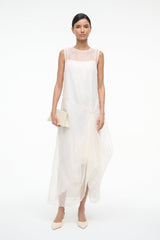 VIOLA ivory sleeveless dress with asymmetrical layered midi hem and waist tie