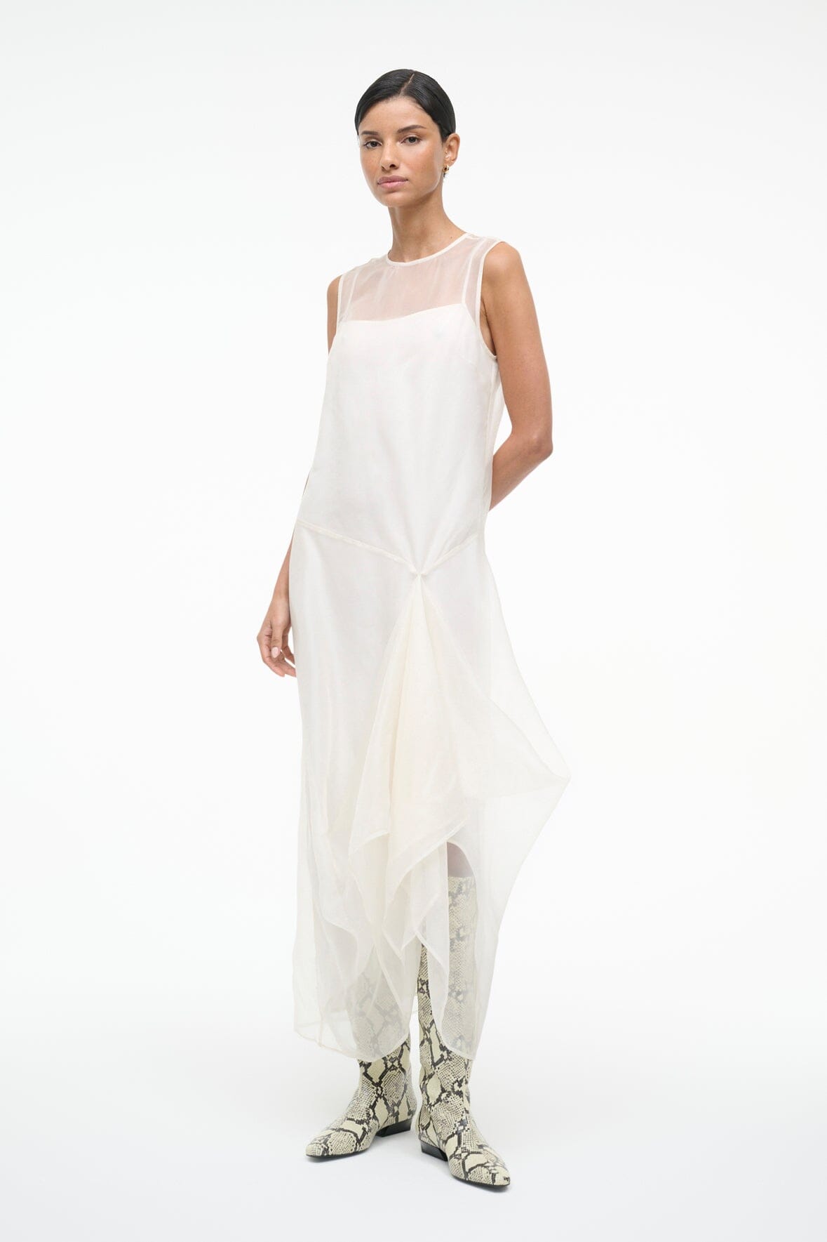 VIOLA ivory sleeveless dress with draped layered skirt and bow at waist