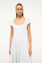 White short-sleeve dress with square neckline and vertical pleats at bodice