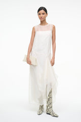 VIOLA ivory sleeveless dress with layered skirt and waist bow detail