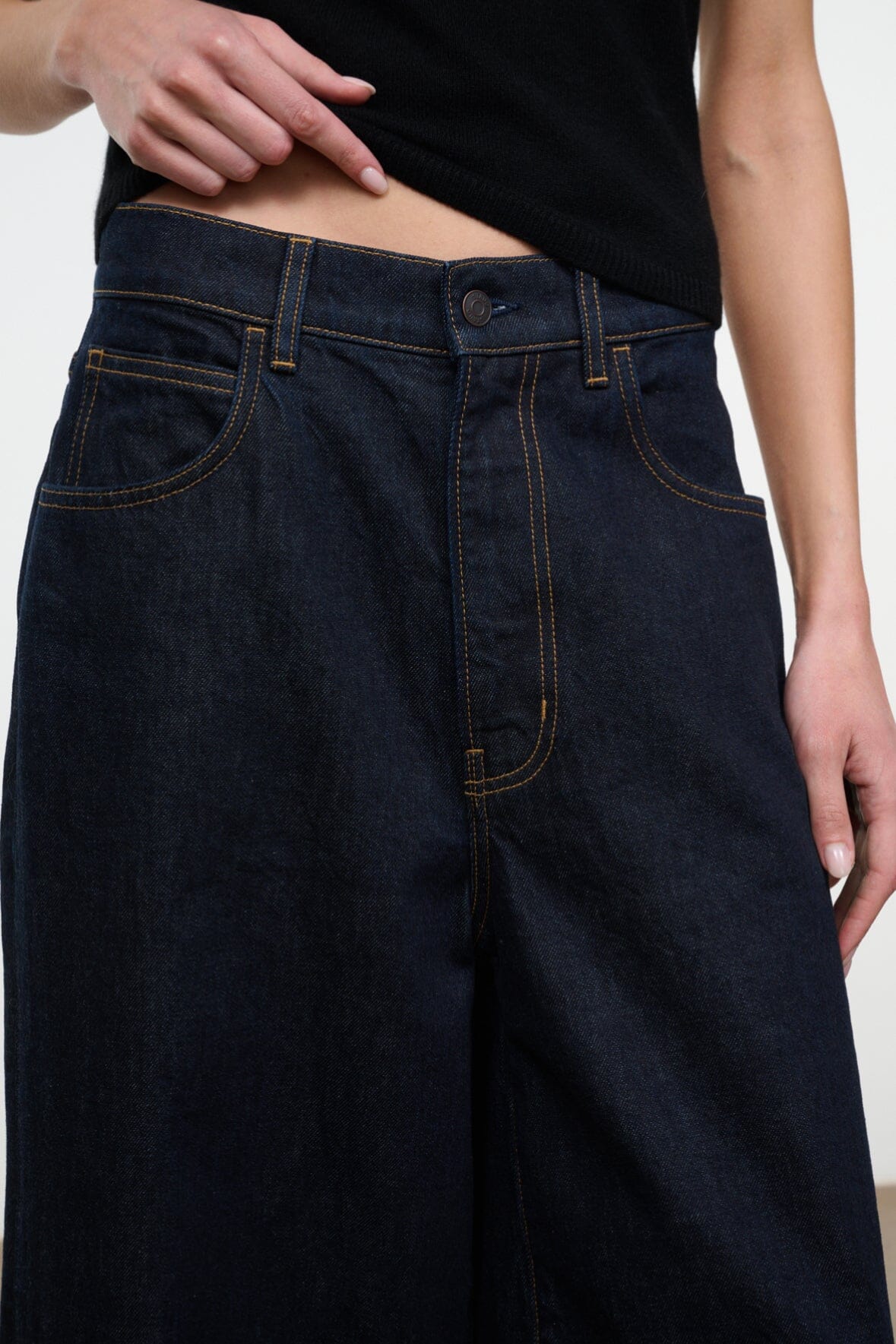 Hunter indigo denim culotte jeans, front view with side pockets and belt loops