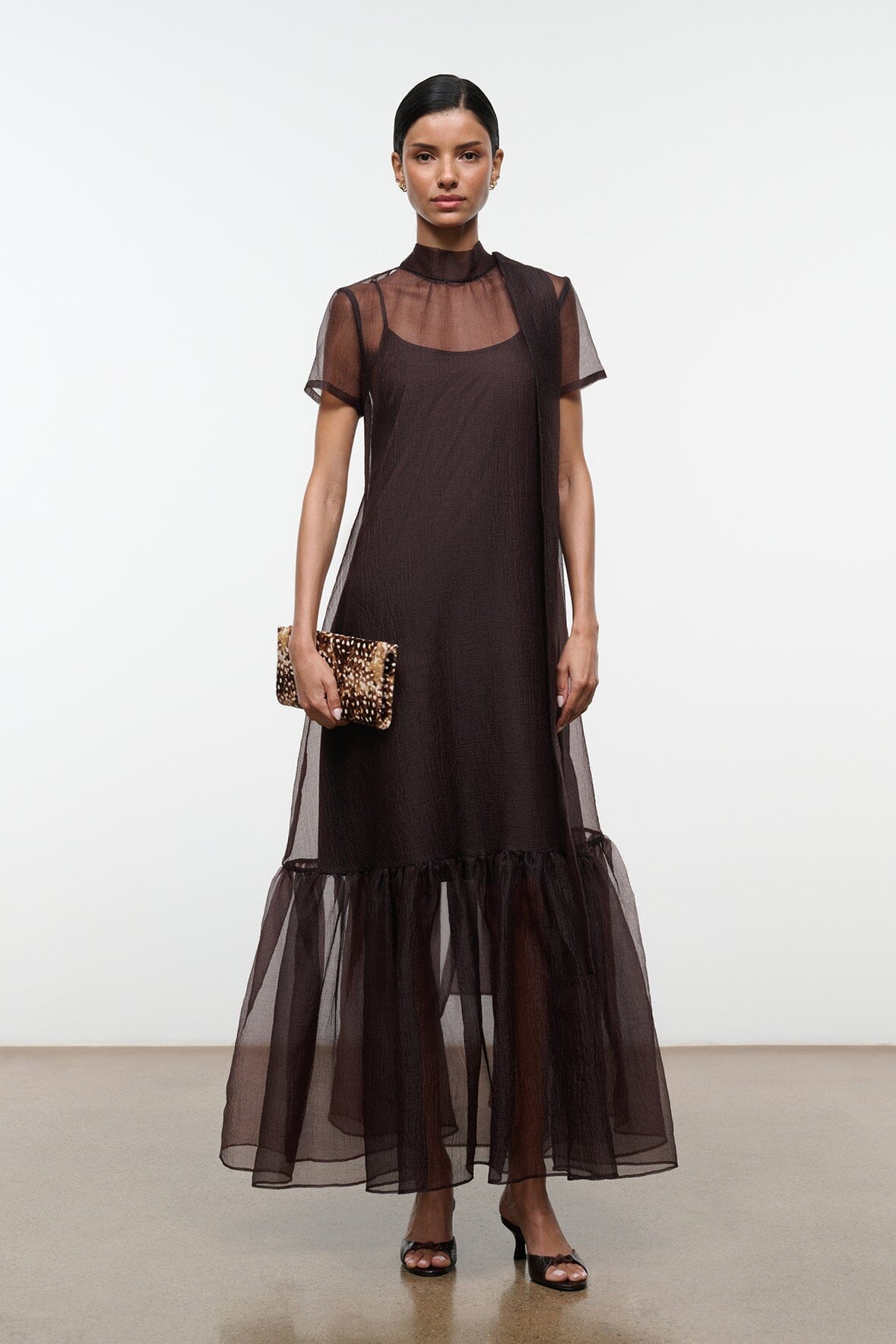 Earth-brown maxi dress with sheer yoke and tiered tulle hem