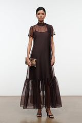 Earth-brown maxi dress with sheer yoke and tiered tulle hem