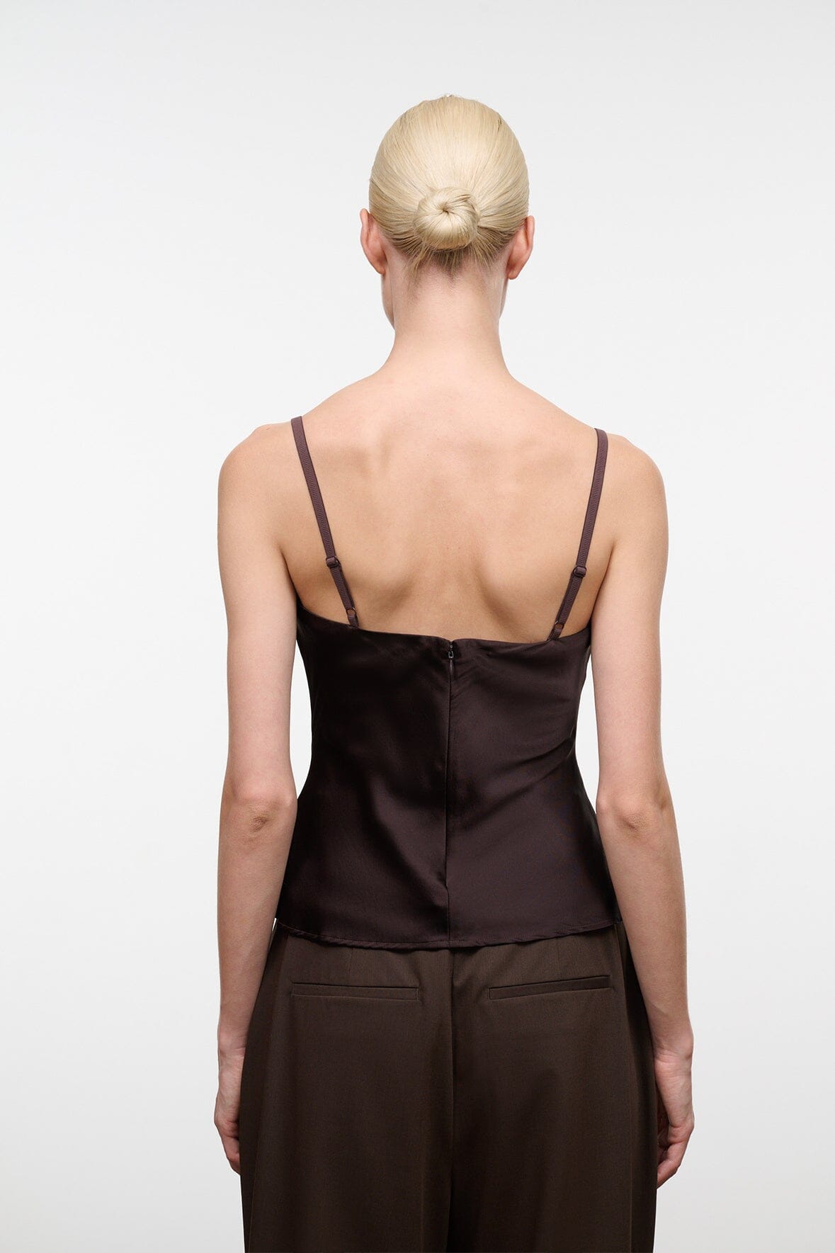 Back view: dark brown silk camisole with spaghetti straps and draped yoke