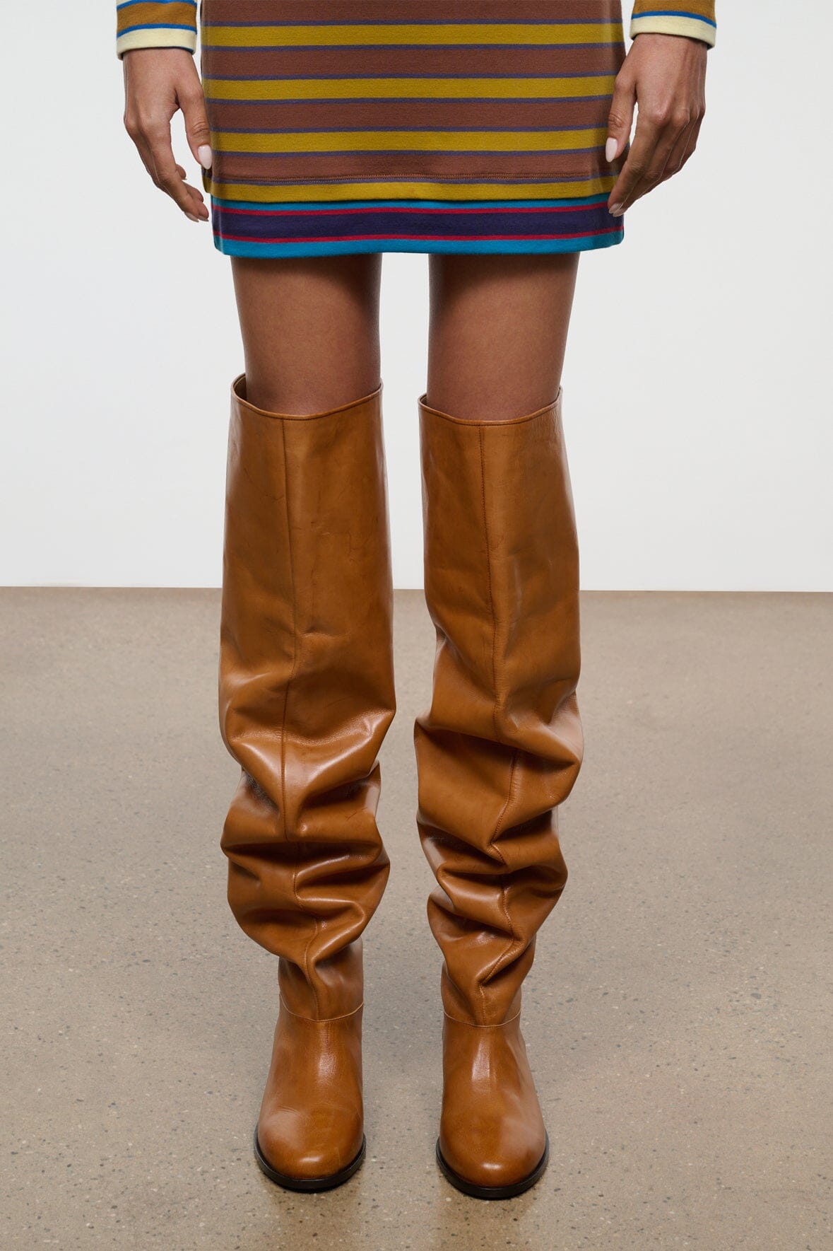 Cashew brown over-the-knee boots with ruched shaft and black block heel