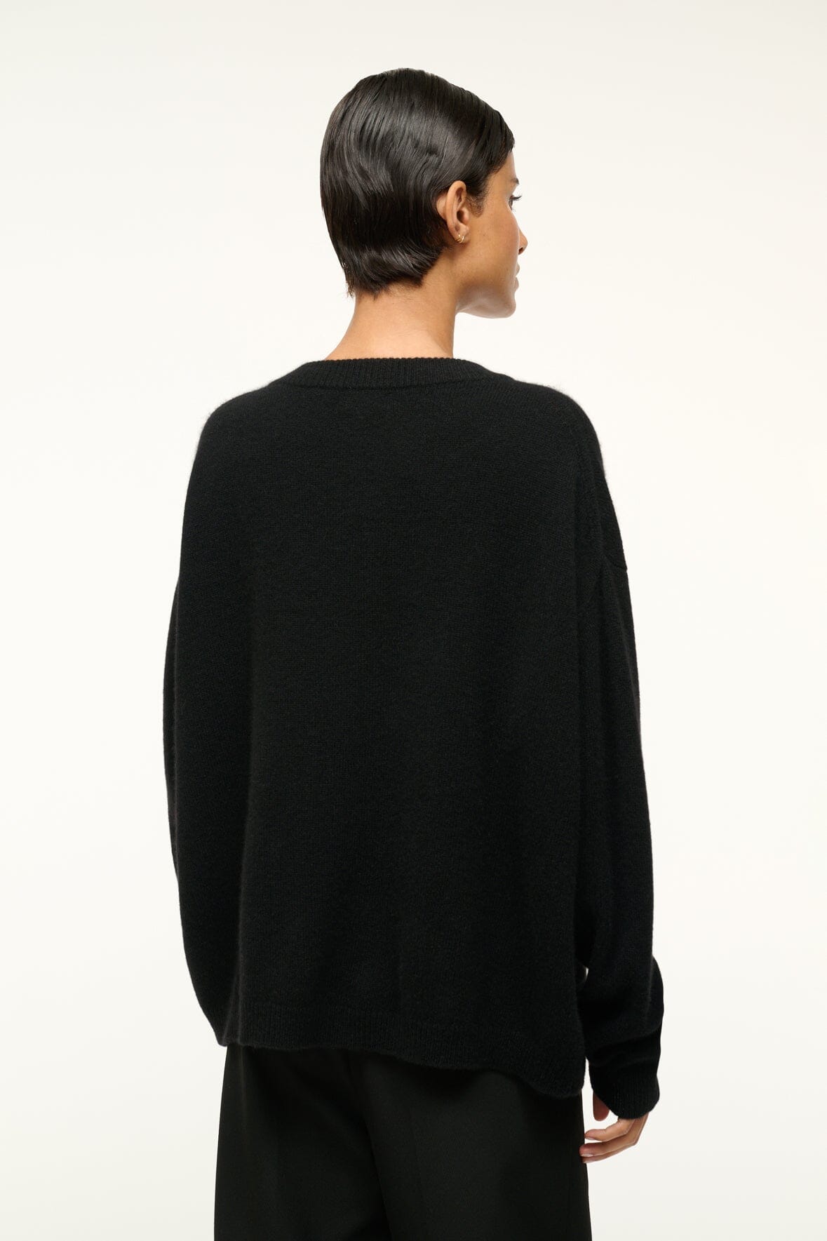 Black relaxed cashmere crewneck sweater, back view, ribbed hem and cuffs