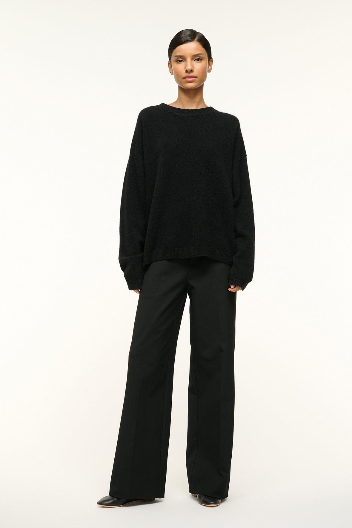 Black relaxed cashmere crewneck sweater with wide cuffs and dropped shoulders