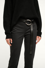Black leather wrap belt with silver ring buckle and long hanging strap