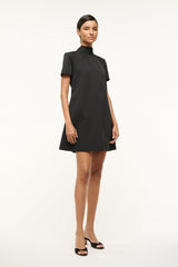 Black mini dress with mock neck and short sleeves, side view
