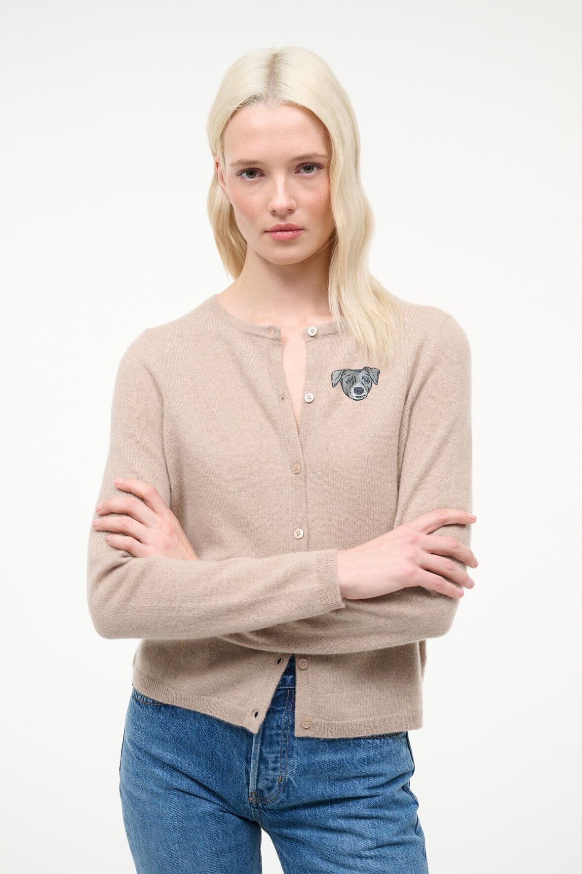 Stone cashmere cardigan with crest patch, button-front; woman wearing