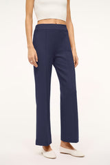 Navy wide-leg pants with smooth front and ankle-length hem