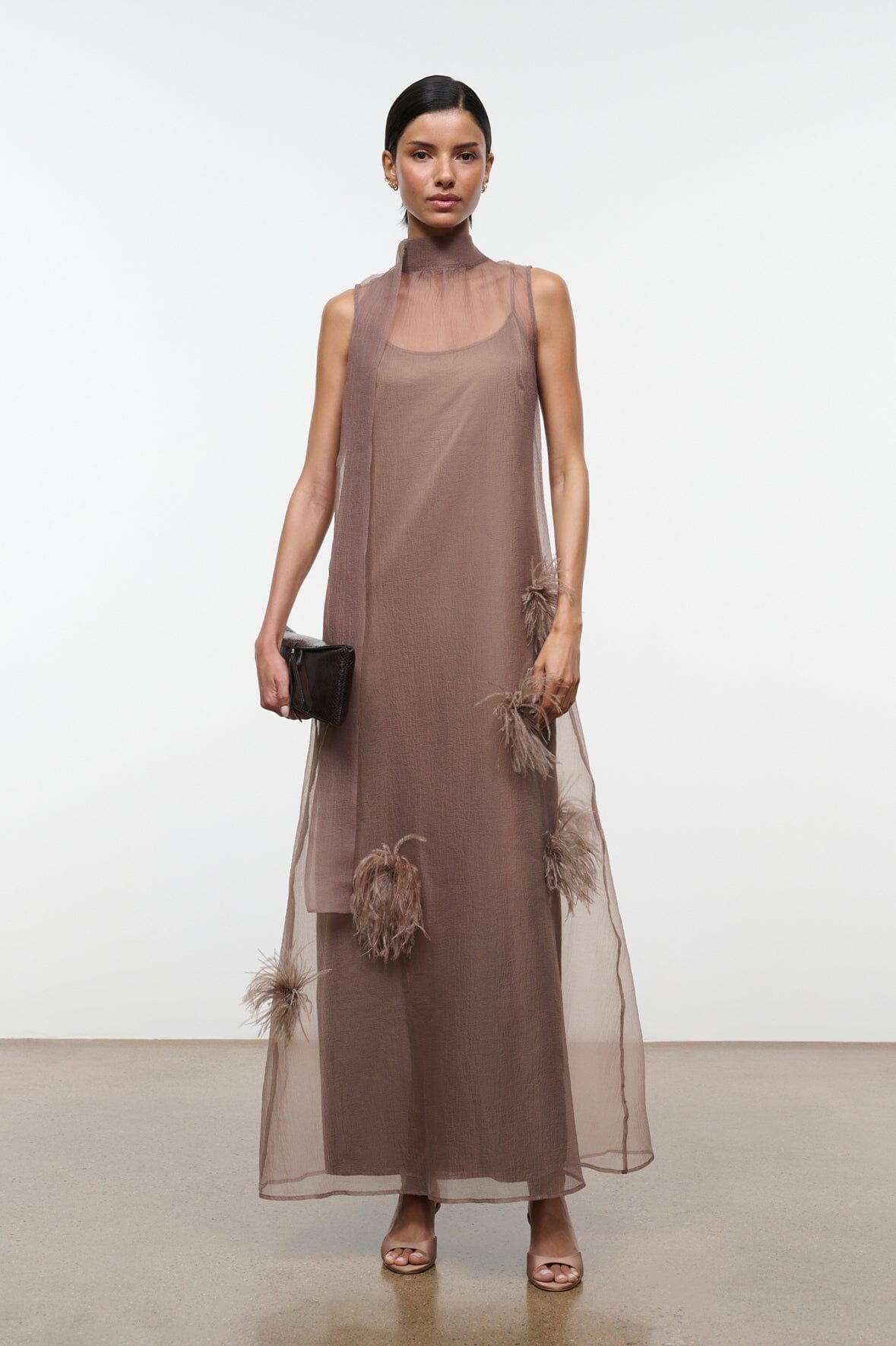 Taupe sleeveless maxi dress with feather applique at hem and side