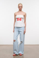 Strapless white graphic top with red 26, short bandeau fit