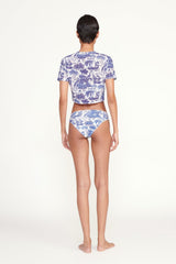 Blue and white printed crop coverup top, short sleeves, back view