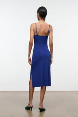 Midnight blue sleeveless midi dress with open back and thin spaghetti straps